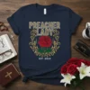 Navy blue t-shirt with "PREACHER LADY EST. 2024" text, a red rose, and leopard print accents