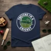 Pretend I'm a Cricket text with a green grasshopper graphic on a navy blue t-shirt