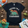 Pretend I'm a Stegosaurus text with a cute stegosaurus wearing a hard hat on a dark t-shirt design