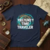 Pretend'm A Time Traveler t-shirt with a circular design featuring clockwork, pyramids, and cityscapes