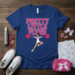 Pretty Little Flyer text with a leaping cheerleader graphic on a navy blue t-shirt