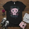 PRETTY 'N' PUNK skull t-shirt with pastel pink floral and butterfly design, featuring distressed typography