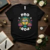 Black t-shirt with "PRO 1973 ROD" text, scales of justice graphic, flowers, and doves