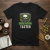 Black t-shirt with "Professional Beer Taster Taster" text, featuring a skull wearing a monocle and a beard, surrounded by hops