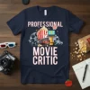 Professional Movie Critic t-shirt design featuring film reel, popcorn, trophy, and laptop with thumbs down icon
