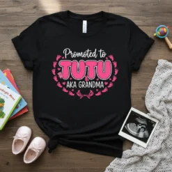 Promoted to Tutu aka Grandma T-Shirt with pink tutu graphic and baby footprints border