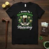 Black t-shirt with "Prone To Shenanigans AND Malarkey" text, featuring leprechauns dancing around a pint of beer for St. Patrick's