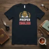 PROPER ENGLISH text on a dark t-shirt with a lion emblem, open book, and laurel wreath graphic