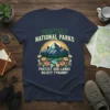 T-shirt with "PROTECT NATIONAL PARKS PROTECT OUR LANDS REJECT TYRANNY" text and a mountain landscape graphic with flowers