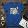 Blue t-shirt with "protect YOUR energy" text and a shield graphic in white and yellow