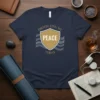 Protecting My Peace Today quote on a navy t-shirt with a shield graphic and wavy lines