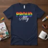 Navy t-shirt with "Proud Ally" text in rainbow colors, symbolizing LGBTQ+ support
