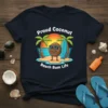 Proud Coconut Beach Bum Life text and graphic of a smiling coconut with sunglasses and a surfboard on a beach