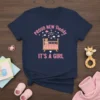Proud New Daddy It's A Girl text design with baby crib and teddy bear graphic on navy t-shirt