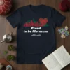 Proud to be Moroccan t-shirt with a heart graphic showing the Morocco flag and a city skyline
