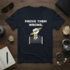Black t-shirt with white text "PROVE THEM WRONG." and a graphic of a fist breaking through a fence with a