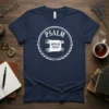 Psalm Book of Praise text on a navy blue t-shirt with a circular laurel wreath design
