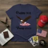 Navy blue t-shirt with "Psalms 91:11 Trump 2024" text, an eagle holding an American flag, and patriotic imagery