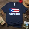 Navy t-shirt featuring a map outline of Puerto Rico filled with the island's flag design and the text "PUERTO RICO"