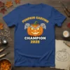 Pumpkin Carving Champion 2025 text with a skeleton carving a jack-o'-lantern on a blue t-shirt
