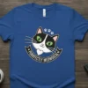 Purrfectly Meowgical t-shirt with a black and white cartoon cat face and paw prints