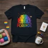 Purride t-shirt design with multiple cats in rainbow colors and the word Purride in rainbow text