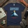 Purrsistence Makes It Possible t-shirt design with a black cat climbing a mountain towards the sun, featuring bold blue text