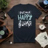 T-shirt with the phrase "PUT ON A HAPPY" above musical notes and a treble clef, white and light blue text