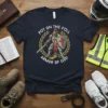 Dark t-shirt featuring a knight ready for battle, with text reading "Put On The Full Armor Of God"