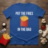 Blue t-shirt with white text "PUT THE FRIES IN THE BAG" and a cartoon graphic of a red carton of