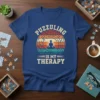 Puzzuling Is My Therapy quote on a vintage-style graphic tee with a meditating silhouette inside a circular puzzle design