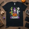 QA SQUAD Halloween t-shirt featuring a witch, wizard, and mummy with a cauldron and spooky decorations