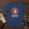 Queen Regal Authority text with royal portrait graphic on a blue t-shirt design