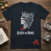 Queen of Bones t-shirt with a white outlined skull wearing a crown and a red beetle amulet