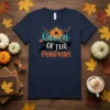Queen Of The Pumpkins t-shirt design with a pumpkin carriage graphic and crown, featuring colorful typography
