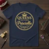 Navy blue t-shirt with gold text "QUEENS ARE NAMED Prisciella" inside a circular emblem with a crown graphic
