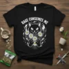 Black cat holding daisies with "Rage Consumes Me" text on a black t-shirt, dark humor design