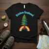 Rainbow Redwood T-Shirt featuring a stylized redwood tree with roots on a colorful rainbow, text above reads "Rainbow Redwood"