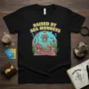 Raised By Sea Monkeys t-shirt design featuring a skeleton in an underwater ruin with sea monkeys and coral