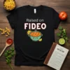 Raised on FIDEO t-shirt with a cute bowl of fideo soup, smiling sun, and lime wedge graphic