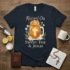 Raised On Sweet Tea & Jesus quote with a mason jar filled with iced tea and a cross graphic, on