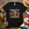 Raised on Sweet Tea AND Sunshine graphic t-shirt with iced tea and sun design