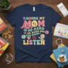 Raising My Mom Is So Hard She Doesn't Listen quote on a navy t-shirt, featuring retro-style typography and a distressed