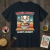 Ramen Addict Always Hungry text with a cute badger character eating ramen on a t-shirt design