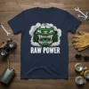 Raw Power monster truck design with aggressive green monster face and white text on a navy t-shirt