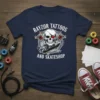 Rayzor Tattoos and Skateshop t-shirt with skull, tattoo machines, and skateboard graphic