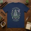 Read Books Be Kind Stay & Weird t-shirt design with a castle, dragon, moon, and hourglass graphics