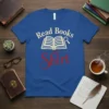 Read Books not Shirt quote with an open book and magnifying glass graphic on a blue t-shirt