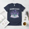 Reading Glasses T-Shirt with an open book and floral design, perfect for book lovers