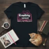 Reading smut makes my kitty purr t-shirt design with a cat on an open book